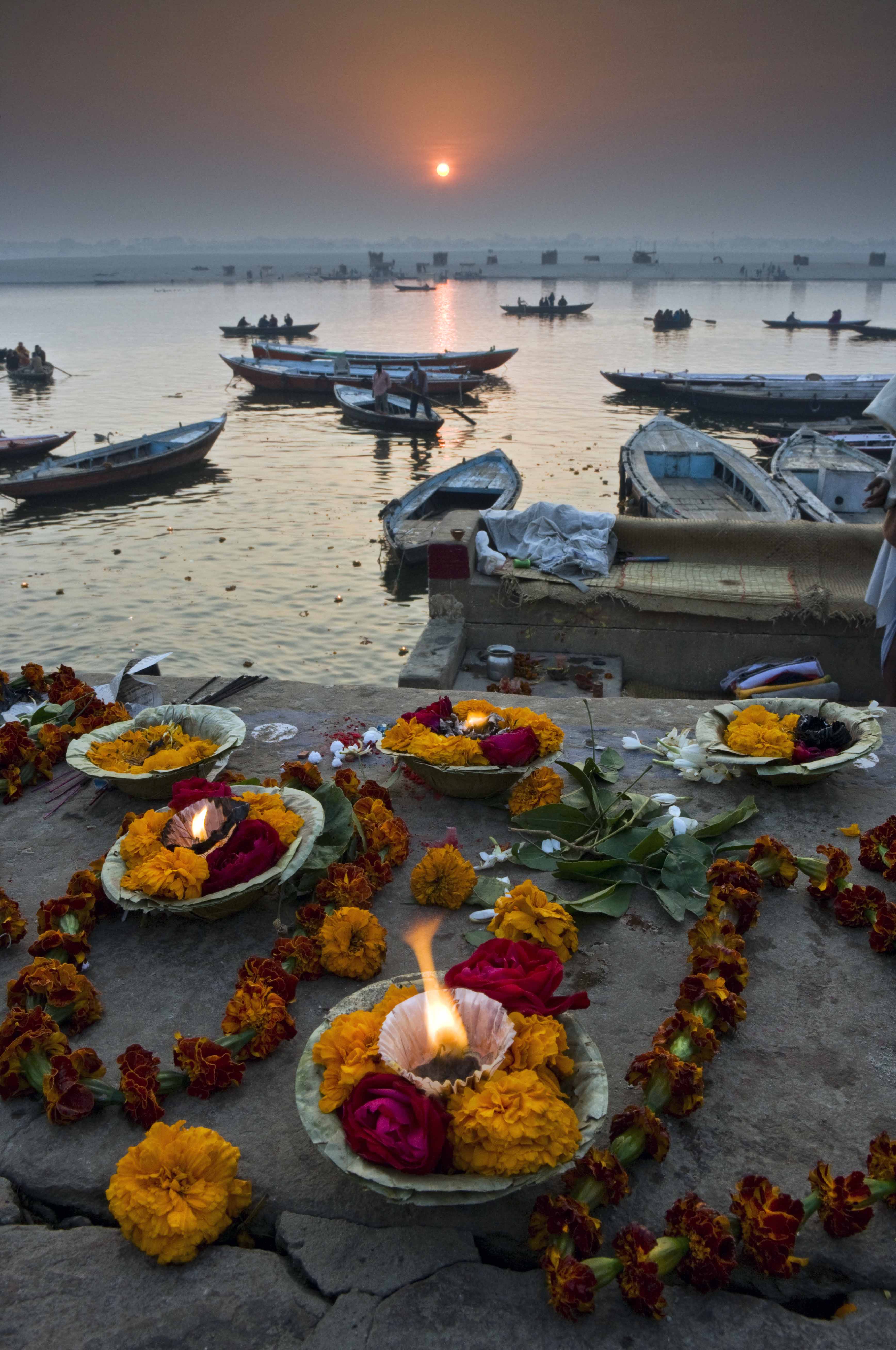 Boats On River At Sunset With Floating Candles — Uttar Pradesh